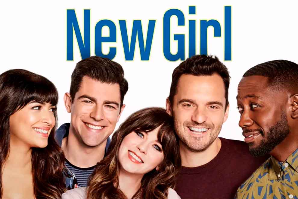Elenco da série New Girl sorrindo juntos